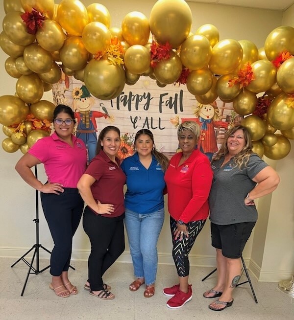 AHA Staff photo with fall background