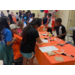 Kids at a table doing crafts.